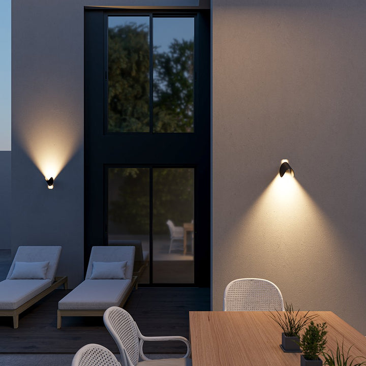 "LED up down black wall sconce light with sleek design for indoor and outdoor use, IP65 waterproof, energy-efficient LED."