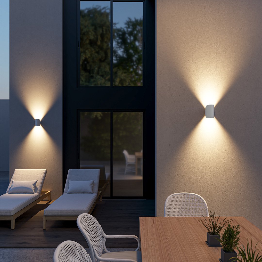 "LED up down black wall sconce light with sleek design for indoor and outdoor use, IP65 waterproof, energy-efficient LED."