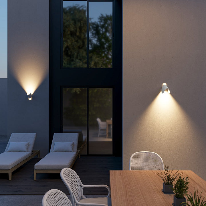 "LED up down black wall sconce light with sleek design for indoor and outdoor use, IP65 waterproof, energy-efficient LED."