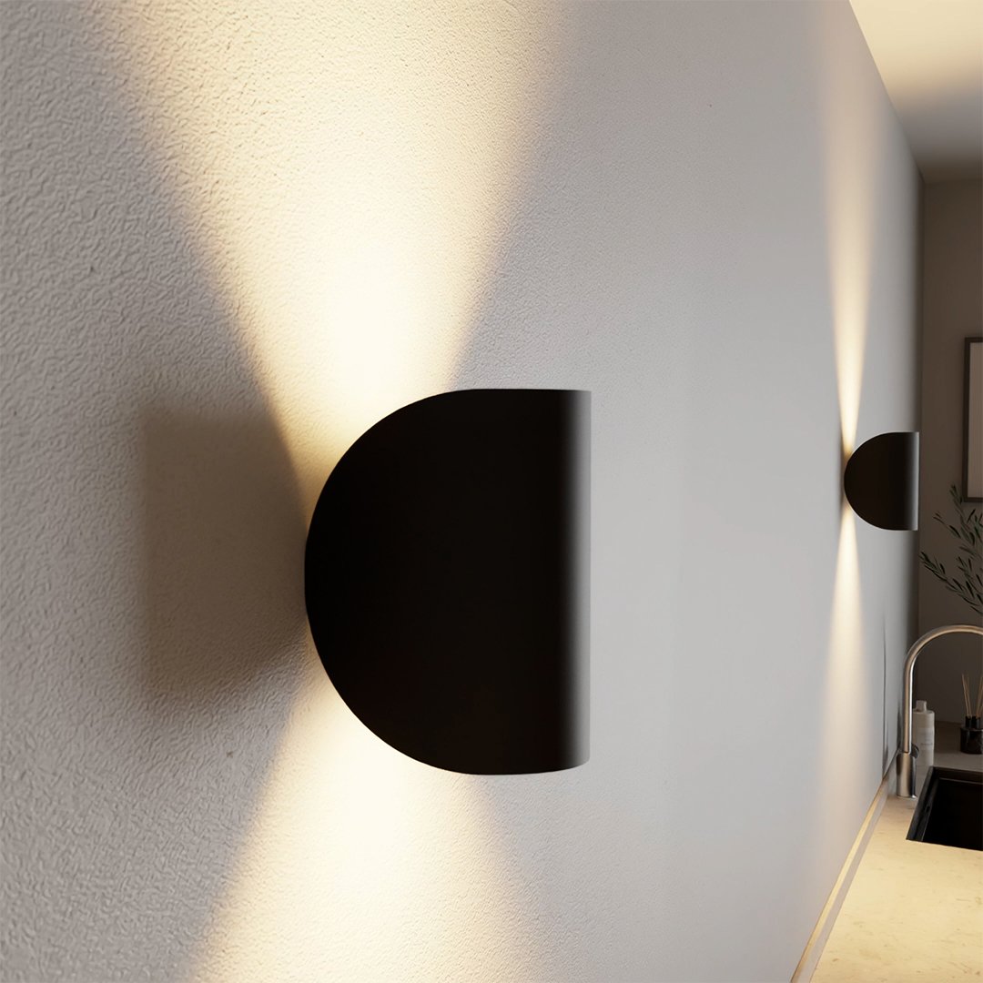 "LED up down black wall sconce light with sleek design for indoor and outdoor use, IP65 waterproof, energy-efficient LED."