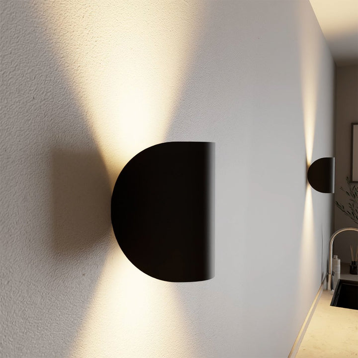 "LED up down black wall sconce light with sleek design for indoor and outdoor use, IP65 waterproof, energy-efficient LED."