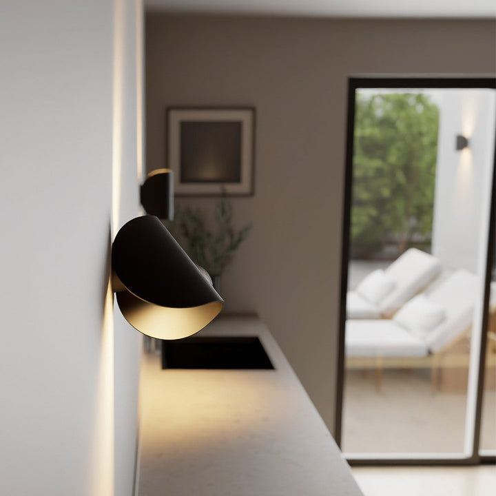 "LED up down black wall sconce light with sleek design for indoor and outdoor use, IP65 waterproof, energy-efficient LED."