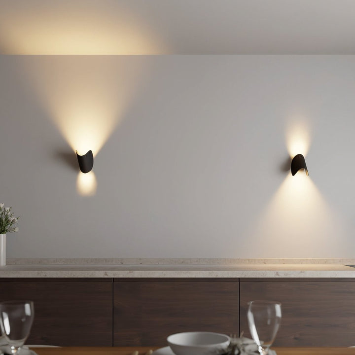 "LED up down black wall sconce light with sleek design for indoor and outdoor use, IP65 waterproof, energy-efficient LED."