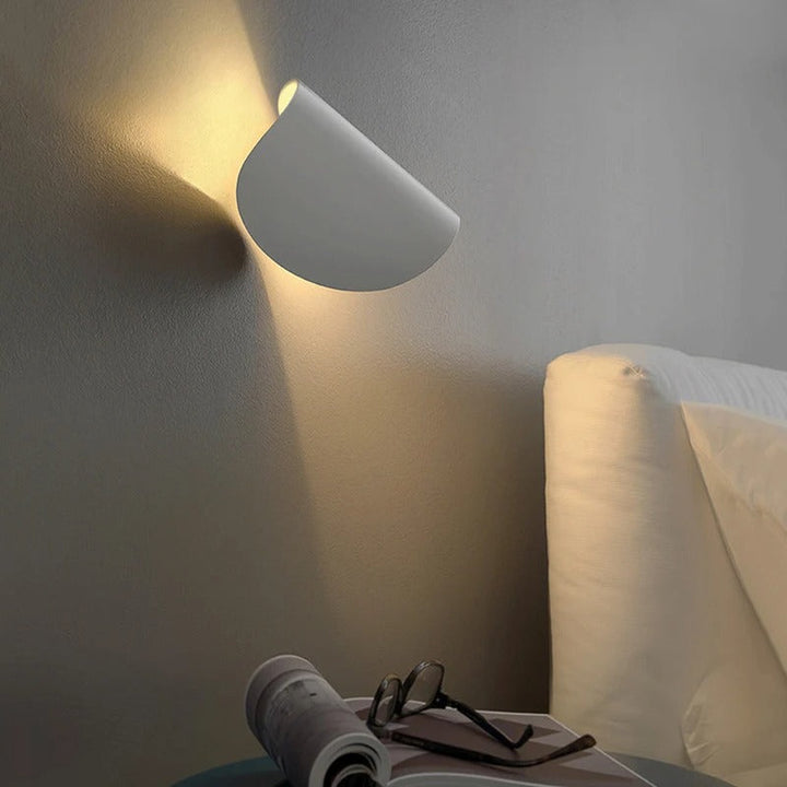 "LED up down black wall sconce light with sleek design for indoor and outdoor use, IP65 waterproof, energy-efficient LED."