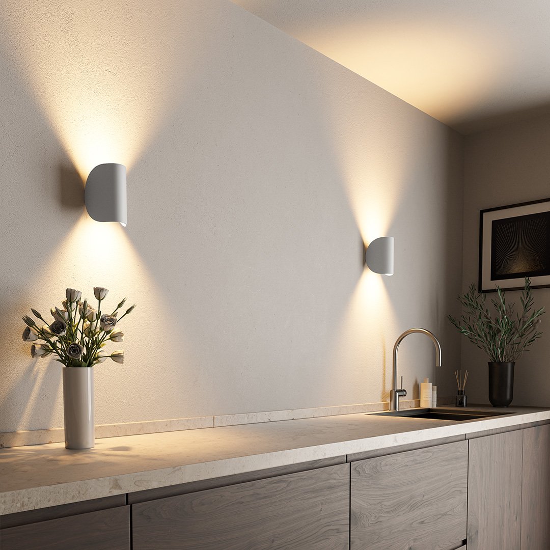 "LED up down black wall sconce light with sleek design for indoor and outdoor use, IP65 waterproof, energy-efficient LED."