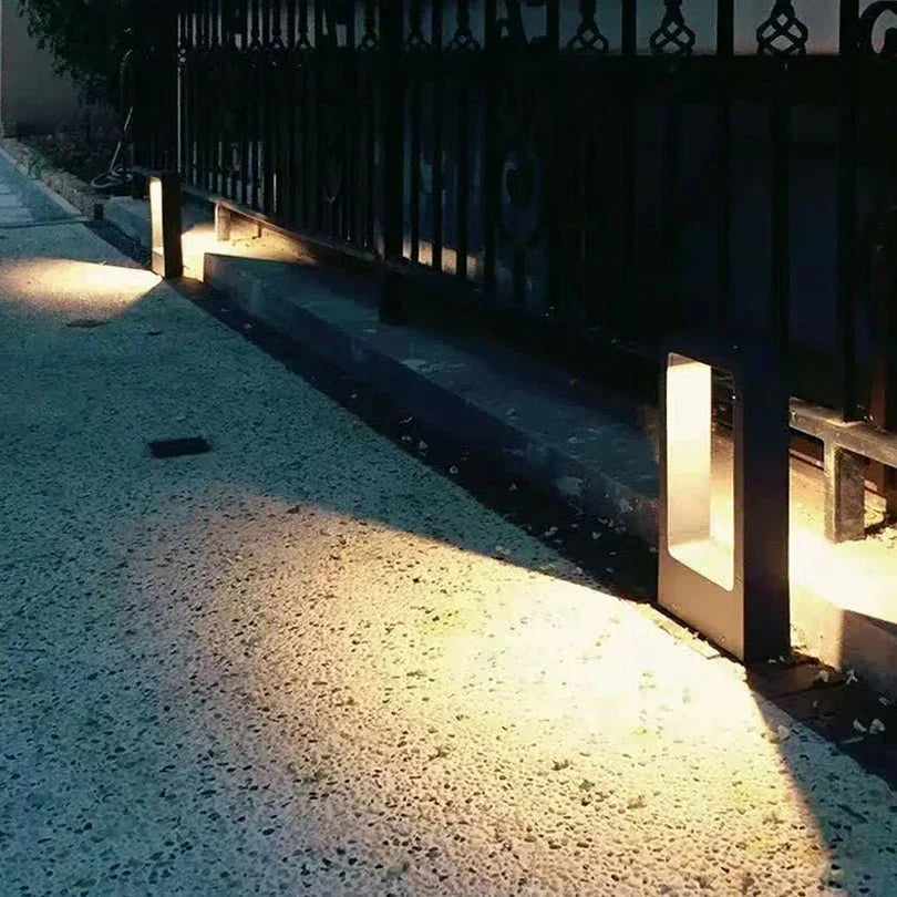 "LED waterproof garden ground light, IP65; sleek design, outdoor lighting for pathways and driveways, cast aluminum, durable.