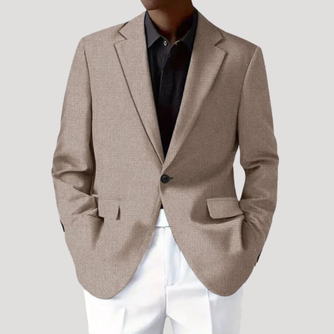 Stylish men's light blue blazer, showcasing a modern tailored fit and textured design
