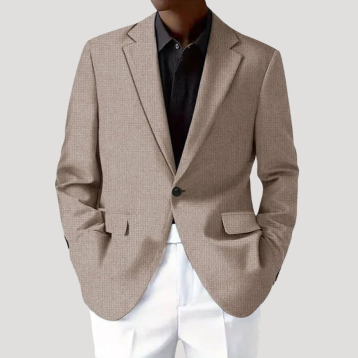 Stylish men's light blue blazer, showcasing a modern tailored fit and textured design