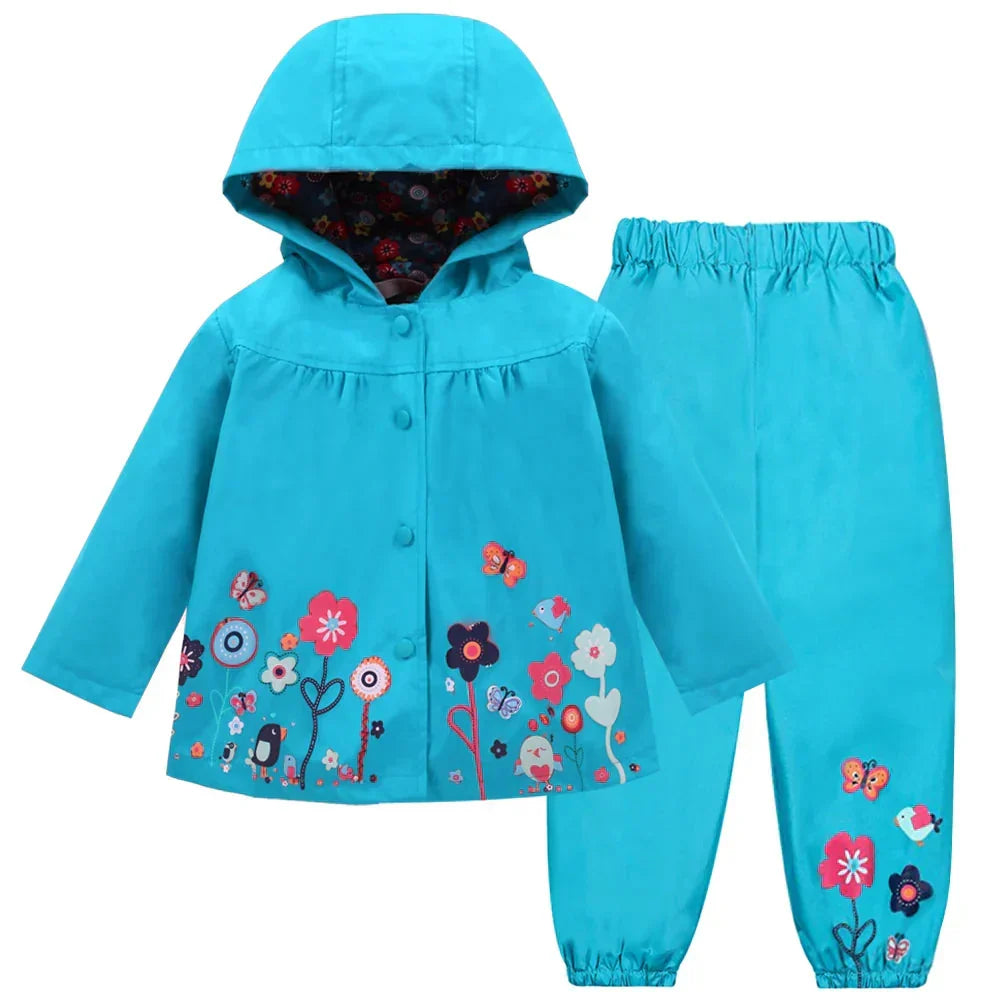 Kids hooded waterproof rain suit by Liora, ideal for toddlers playing outdoors in wet & windy conditions.