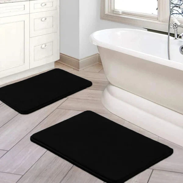 "Luxurious velvet bath mat with memory foam, anti-slip backing, plush coral surface, available in assorted colors and sizes."