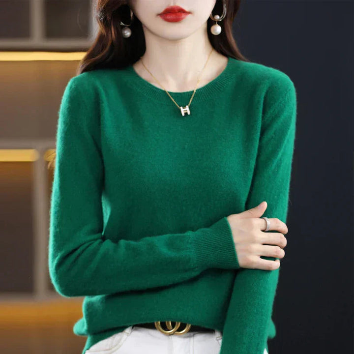 Comfortable women's crewneck pullover sweater. Soft, warm, and versatile for casual or elegant fashion.