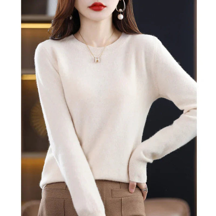 Versatile women's crewneck pullover sweater, soft and warm. Offers a relaxed fit for comfortable wear.
