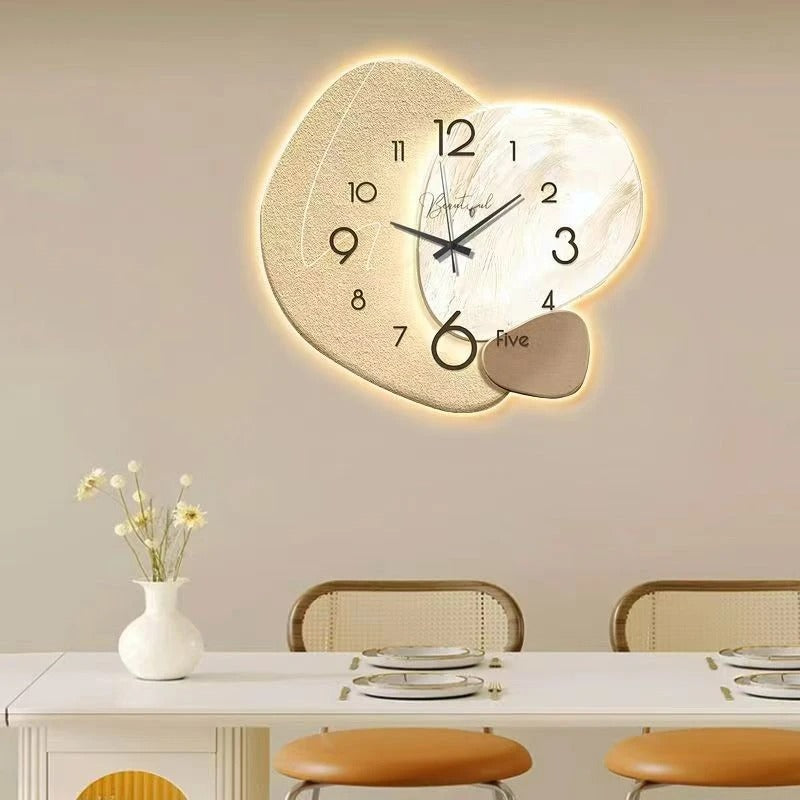 "Luxury LED wall clock; sleek design with illuminated analog face, ideal for modern interiors, home or dining spaces."
