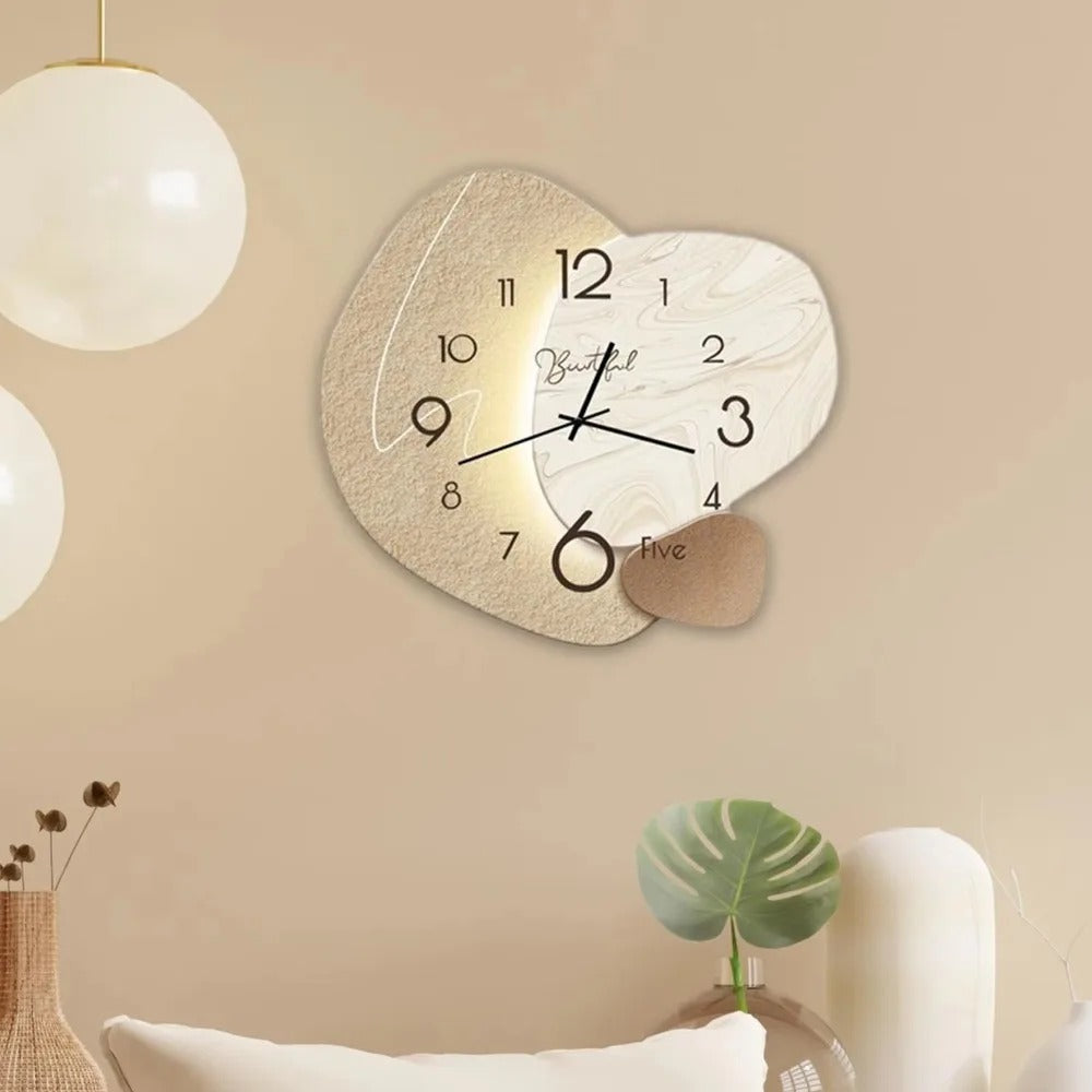 "Luxury LED wall clock; sleek design with illuminated analog face, ideal for modern interiors, home or dining spaces."