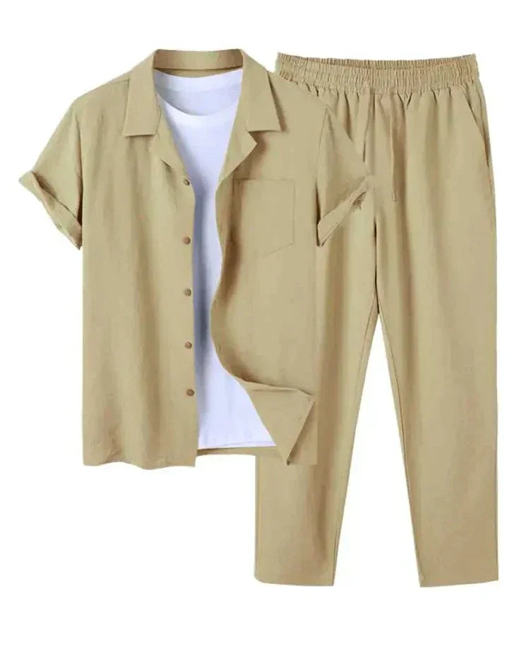 Man in stylish beige men's casual summer short sleeve shirt and shorts matching two-piece set, ideal for beach vacation.
