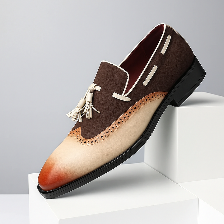 Pair of men's navy blue smart casual tassel loafers with comfortable cushioning and brogue accents.