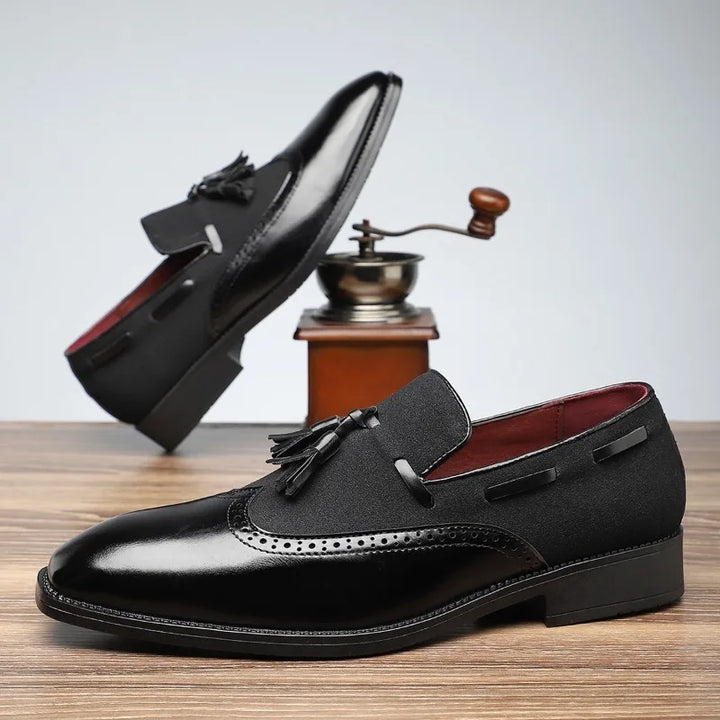 Men's cushioned tassel loafers in tan leather, showcasing brogue perforations and stylish tassels.