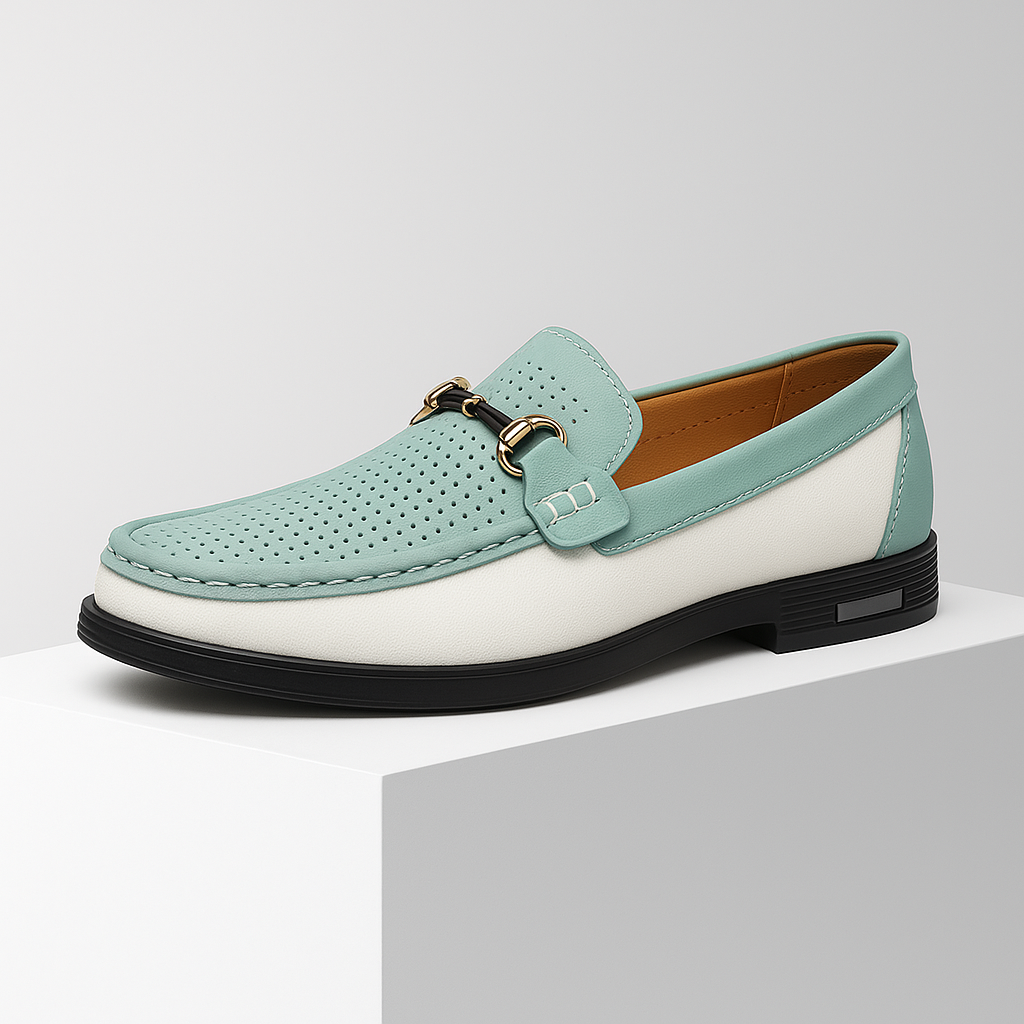 Detailed shot of the metallic bit on men's black leather slip-on loafers
