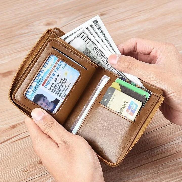 Brown genuine leather RFID blocking wallet for men, shown open with ID window and cash compartment.
