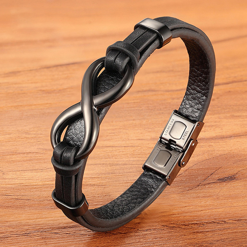 Elegant men's jewelry: a braided black leather bracelet, perfect as a fashion accessory.