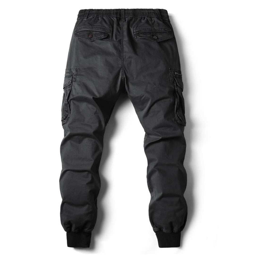 Men's casual black jogger pants with elastic waist and tapered fit, ideal for streetwear comfort.