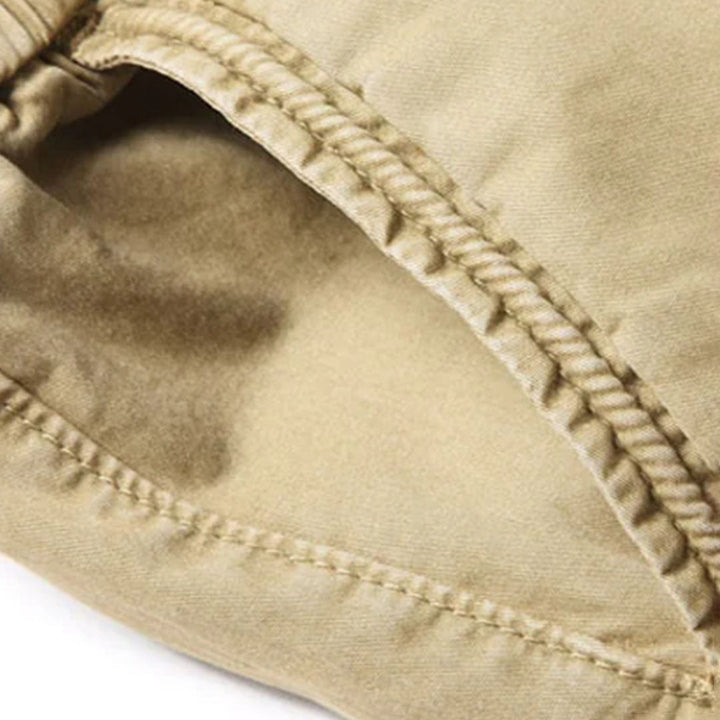 Comfortable men's streetwear joggers in a versatile color, showcasing the elastic waist detail.