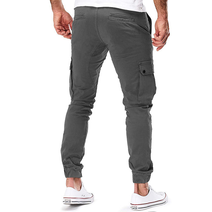 Khaki men's cargo pants made for everyday wear, featuring durable fabric and spacious side pockets.