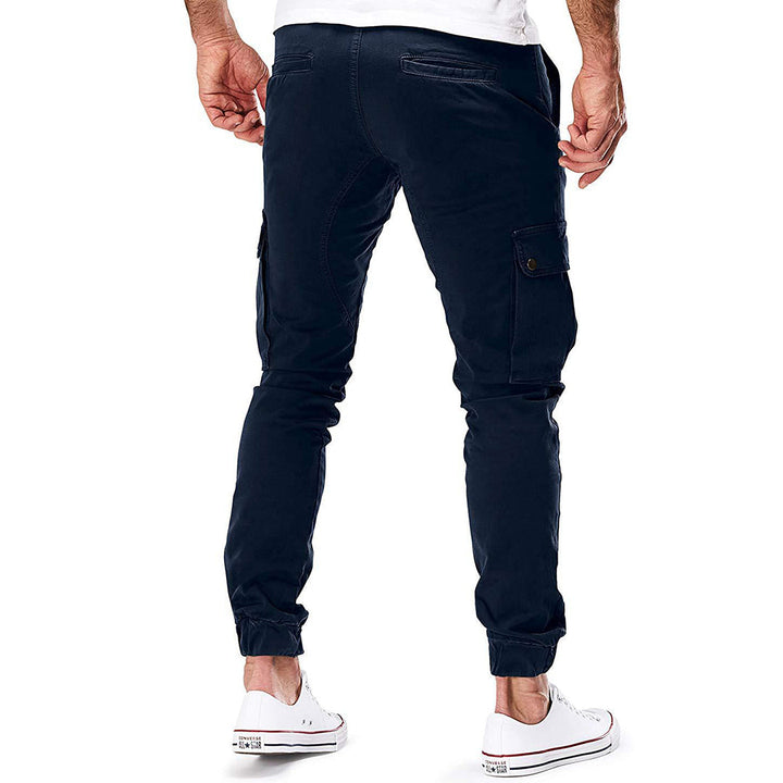 Navy blue men's utility pants with multiple cargo pockets, offering both style and ample storage.