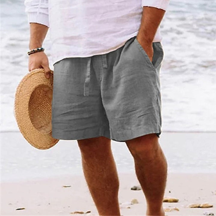 Soft, comfortable men's drawstring chino shorts, knee-length, ideal for summer activities.