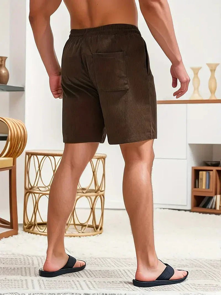 Summer men's apparel: casual drawstring shorts, relaxed fit, and practical pockets for everyday.