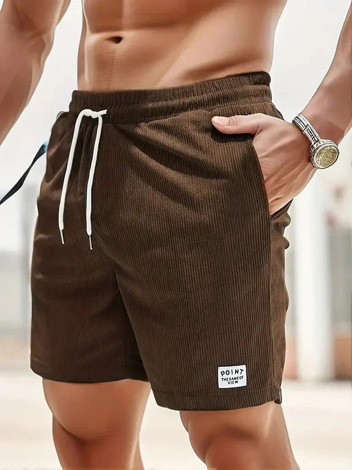Men's relaxed fit casual shorts with drawstring, comfortable for warm weather and daily activities.