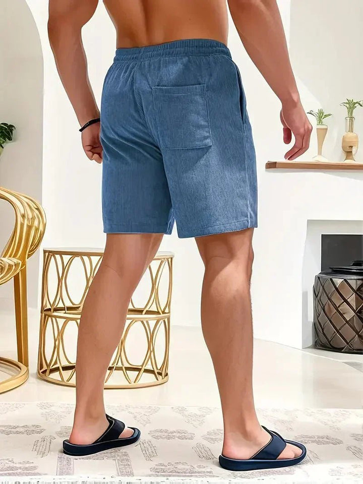 Men's summer apparel: versatile drawstring shorts for casual comfort and everyday wear.