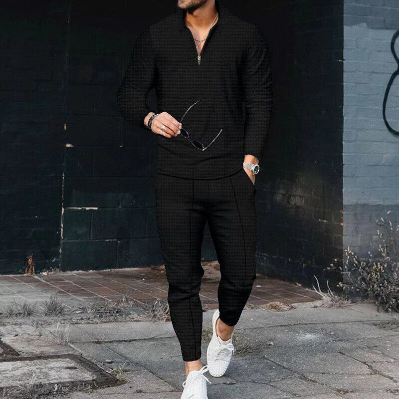 Stylish black men's casual two-piece set, including a zip-front top and matching trousers for everyday comfort.