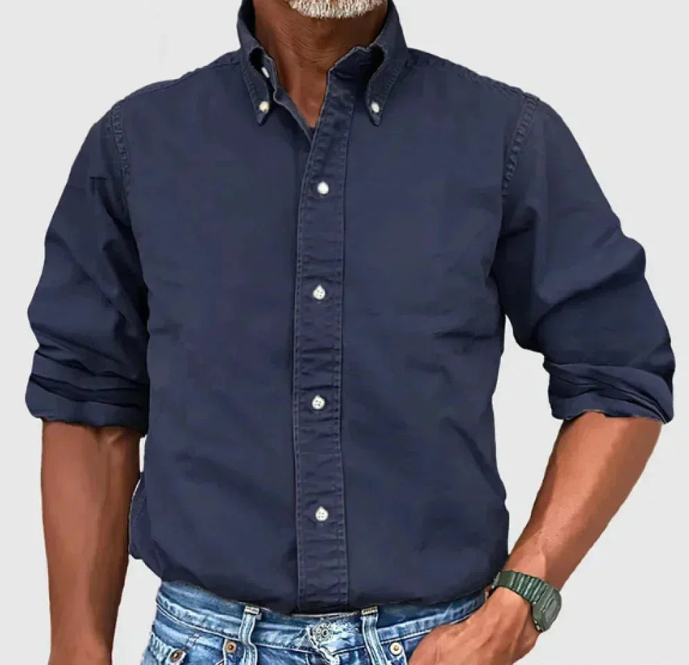 Stylish khaki men's button-up shirt with long sleeves, offering a casual yet refined look