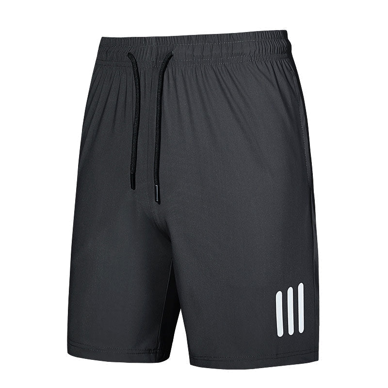 Close-up of men's athletic shorts, showcasing the elastic waistband and adjustable drawstring for a snug fit.
