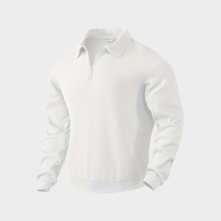 Heap of folded men's casual textured half-zip pullovers in assorted colors, retail display