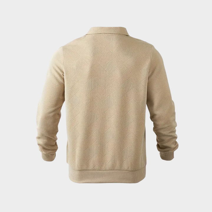Side view of a man wearing a dark blue casual textured half-zip longsleeve pullover