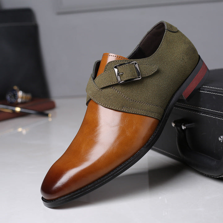 Close-up of a men's luxury black leather loafer with a polished buckle.