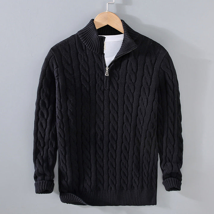 Men's classic cable knit half-zip pullover sweater in a detailed close-up shot, perfect for winter wear.