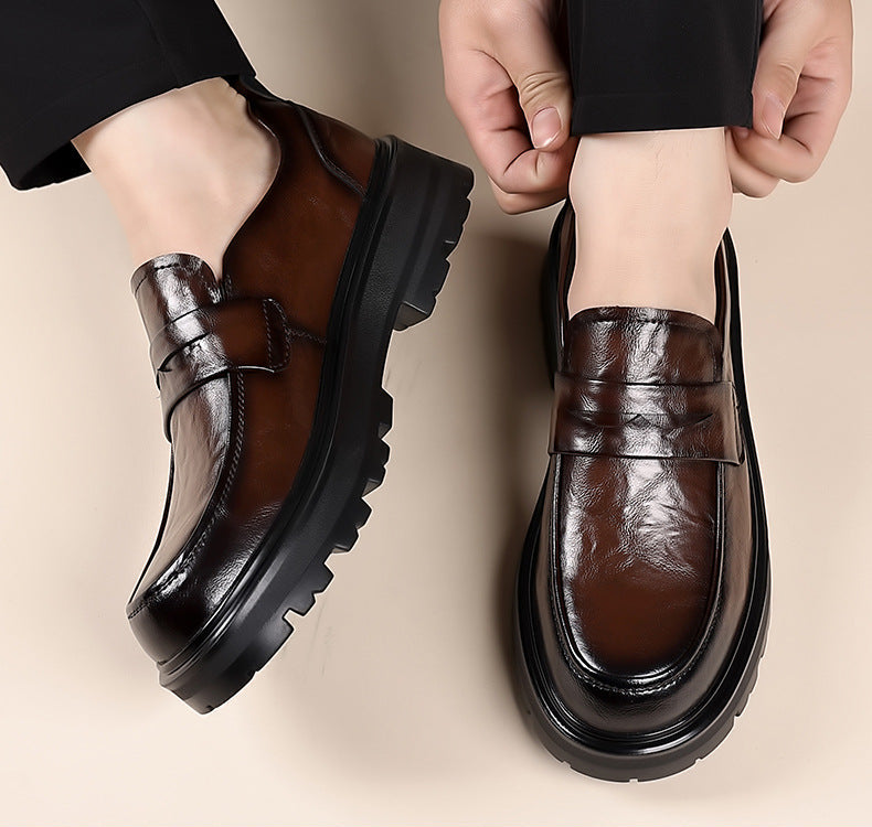 Chunky sole black penny loafers for men. Classic slip-on design, durable and comfortable men's footwear.