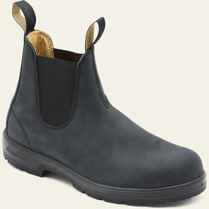 Close-up of men's black leather Chelsea boots, showcasing smooth finish, perfect for dress or everyday wear.