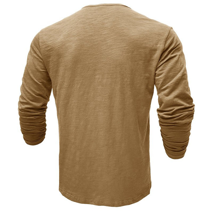 Detailed shot of the fabric texture of a comfortable men's henley top.