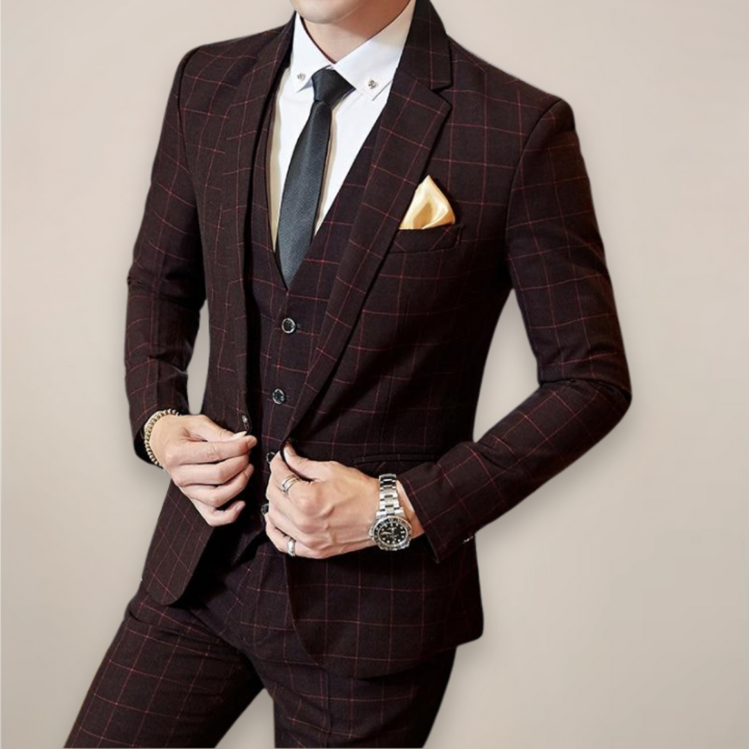 Stylish men's three-piece plaid suit, ideal for weddings and warm-weather business or formal occasions.