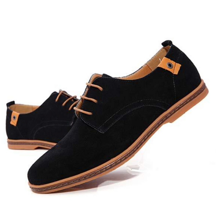 Polished leather round-toe dress shoes for men. Ideal formal footwear for a smart casual look.