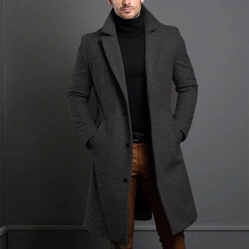 Elegant men's single-breasted trench coat style overcoat. Tailored outerwear for smart casual or formal business fashion.