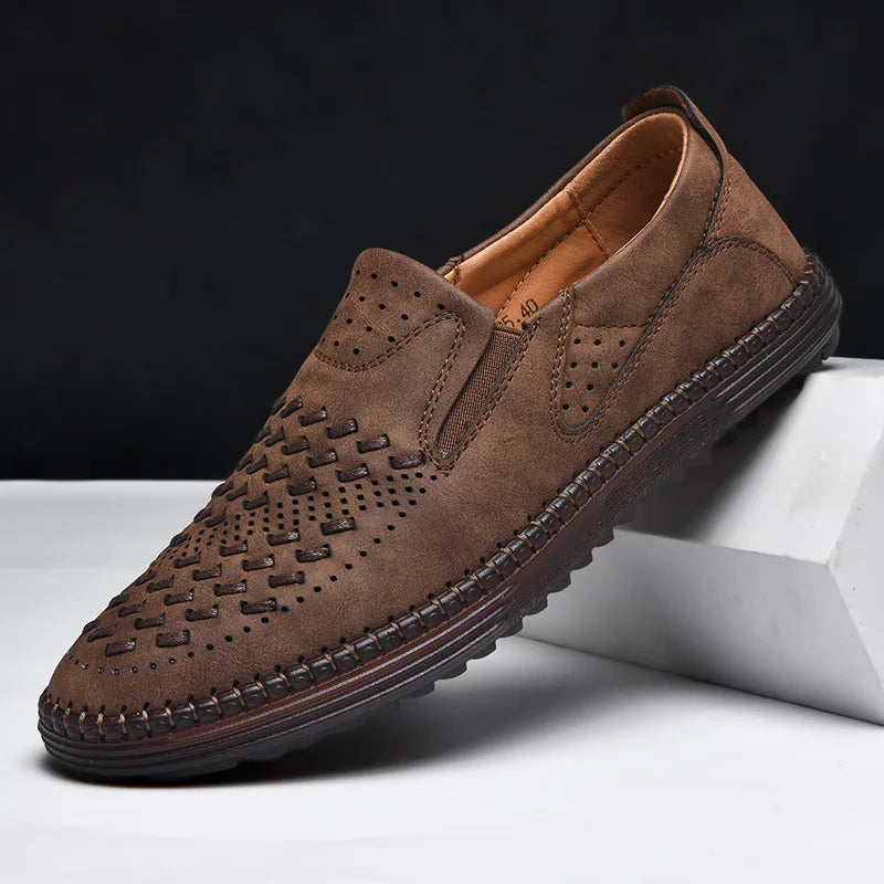 Breathable black slip-on shoes, men's fashion footwear for all-day comfort.