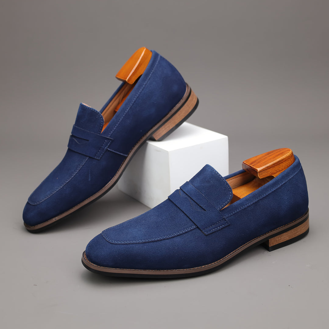 Blue men's slip-on loafers, versatile classic shoes for comfortable casual wear or smart dressy looks.