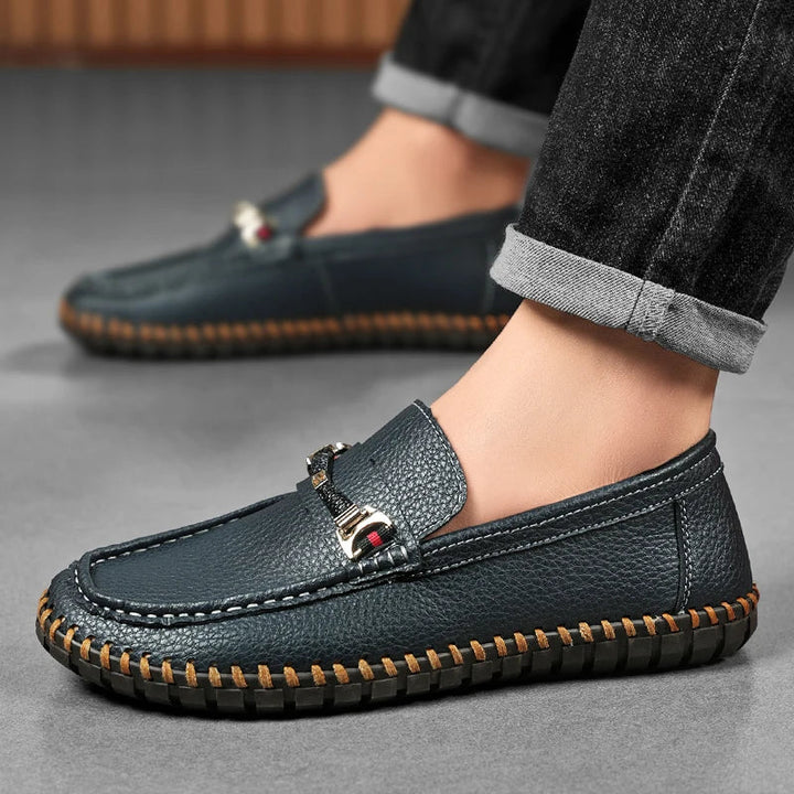 Close-up of stitching details on men's exquisite leather bit loafers, high-quality, durable footwear
