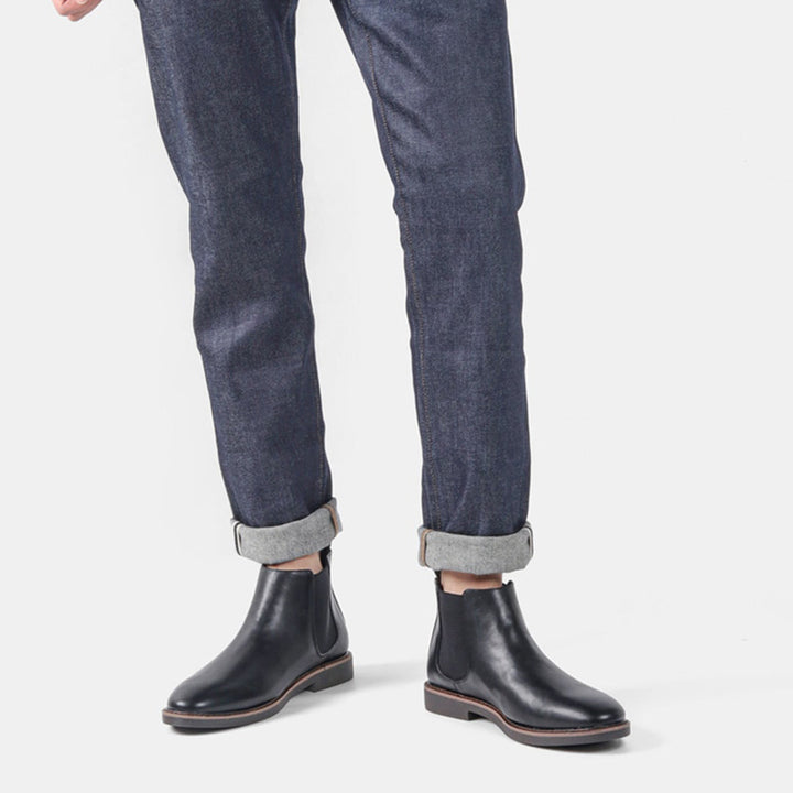 Men's fashionable Chelsea boots in a rich burgundy leather, adding a pop of color to outfits
