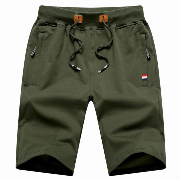 Versatile men's drawstring active shorts for beach or gym, featuring convenient zipper pockets for essentials.